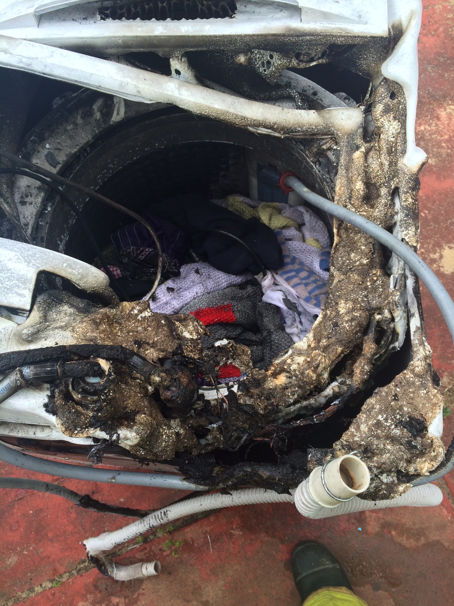 Burned Samsung top loader in Parmelia